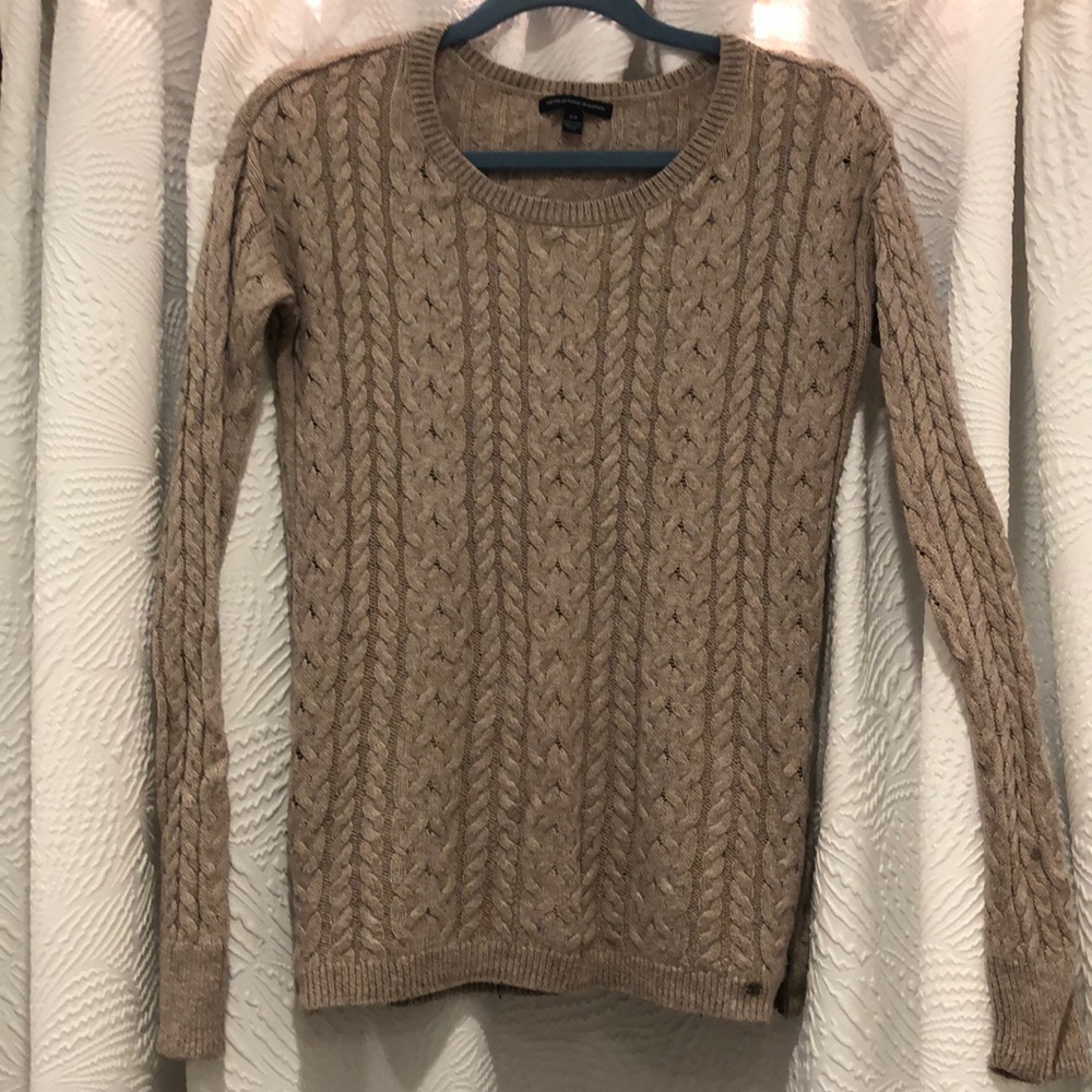 Tan, knit sweater. Zippers on both sides